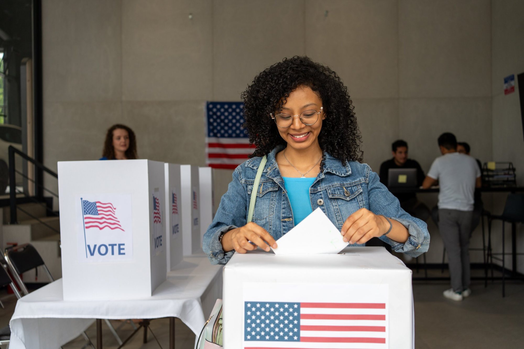 Voter casting a ballot at a polling place